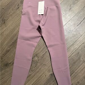Lululemon glow up super high rise 28”.  Lavender lux